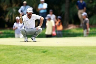 American Cameron Young lines up a putt on the way to the first-round lead in the PGA Tour Cadillac Championship