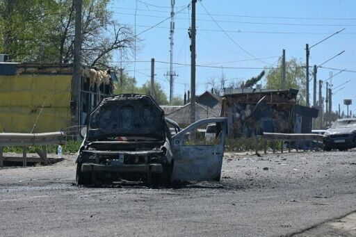 AFP journalists in Merefa saw several bodies strewn in the street
